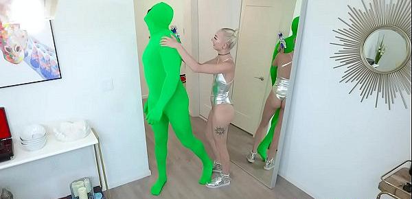  Chloe Temple rubs and caresses the aliens huge cock and wrpas her lips around it